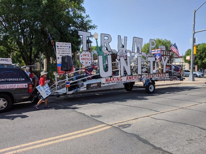 The Trump Unity Bridge, a huge patriotic float that featured Trump banners, an eight-foot model of the Statue of  Liberty and an actual Harley-Davidson, made a whistle stop at the Luna County GOP headquarters Tuesday on E. Spruce Street. This Unity Bridge originated in Livonia, Michigan and has traveled through several states and and cities. The float was headed to Donald Trump’s golf course in Doral, Florida. This vehicle is manned by Trump supporter, Rob Cortis of Livonia, Michigan. Visit:  www.TrumpUnityBridge.com.