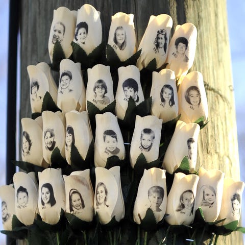 Roses with the faces of the 2012 Sandy Hook Elemen