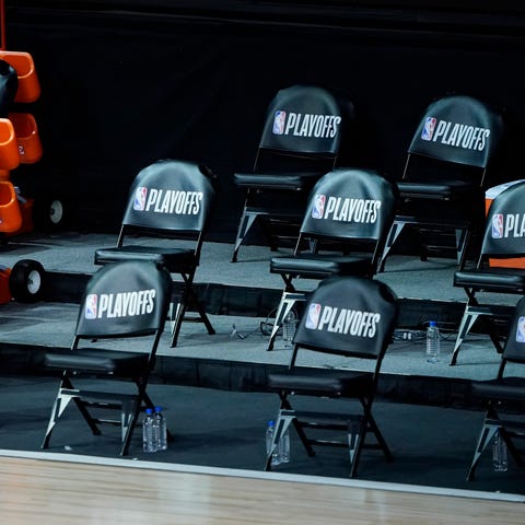 The Bucks bench remains empty after the scheduled 