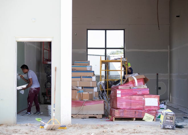 Drywall is being finished inside the luxury auto condos under construction at Bonita Breeze on Bonita Beach Road on Thursday, August 28, 2020, in Bonita Springs.