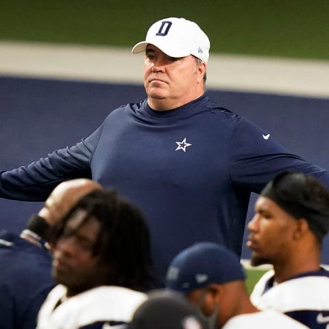 Dallas Cowboys head coach Mike McCarthy spreads hi