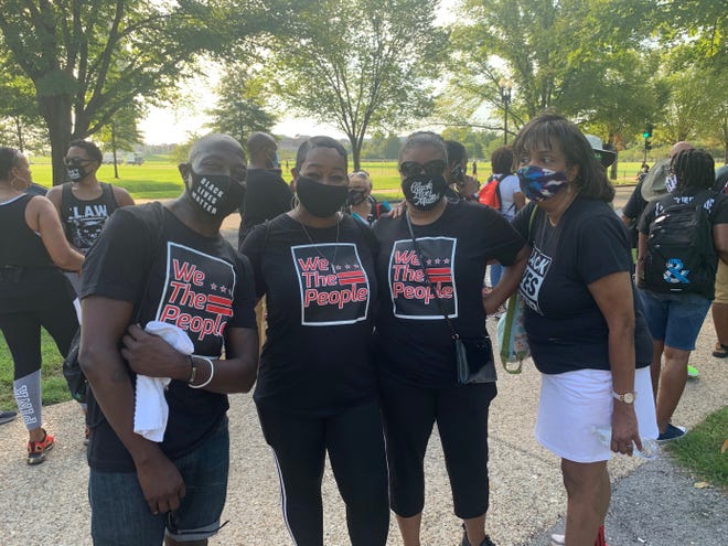Narvin Gray, left, with cousin Kendra Butler and other family members on Friday, Aug. 28, 2020 in Washington, D.C. ahead of the March on Washington.