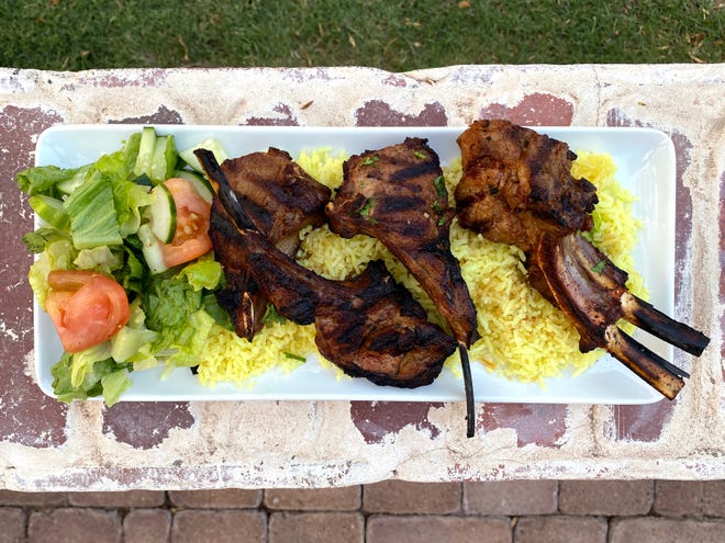 Grilled lamb chops with rice and salad from Mijana in Tempe.