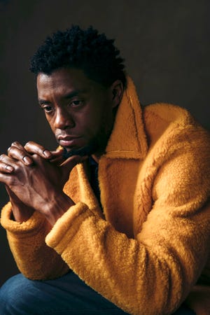 Actor Chadwick Boseman poses for a portrait in New York to promote his film, "Black Panther," on Feb. 14, 2018.