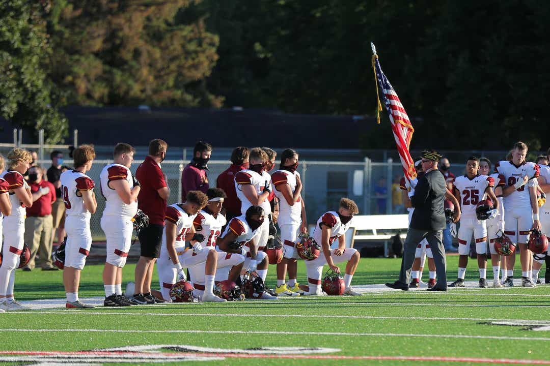 'Do it the right way': Roosevelt football players take knee during anthem - Argus Leader