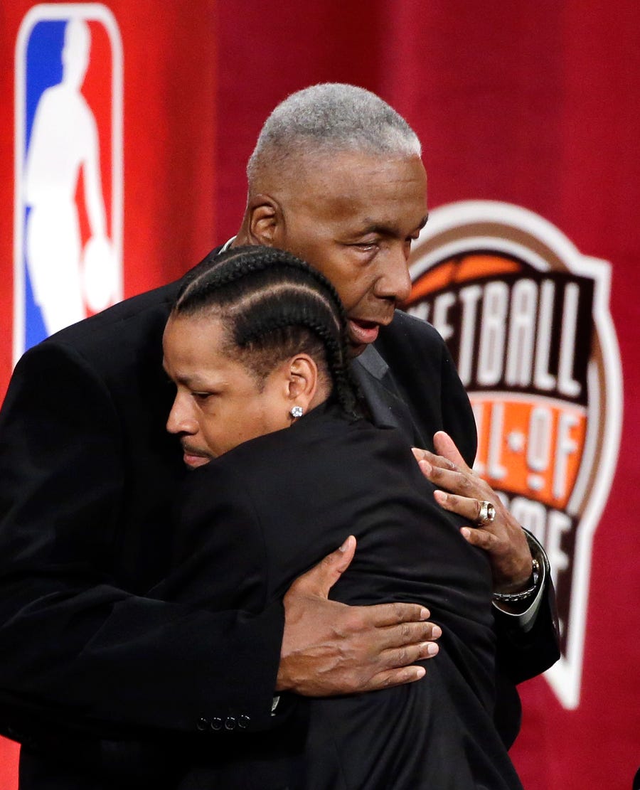 Allen Iverson, left, hugs presenter and former coach John Thompson during Hall of Fame induction ceremonies in 2016.