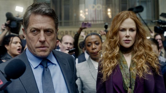 Hugh Grant, Noma Dumezweni, center, and Nicole Kidman act in HBO's "The Undoing."