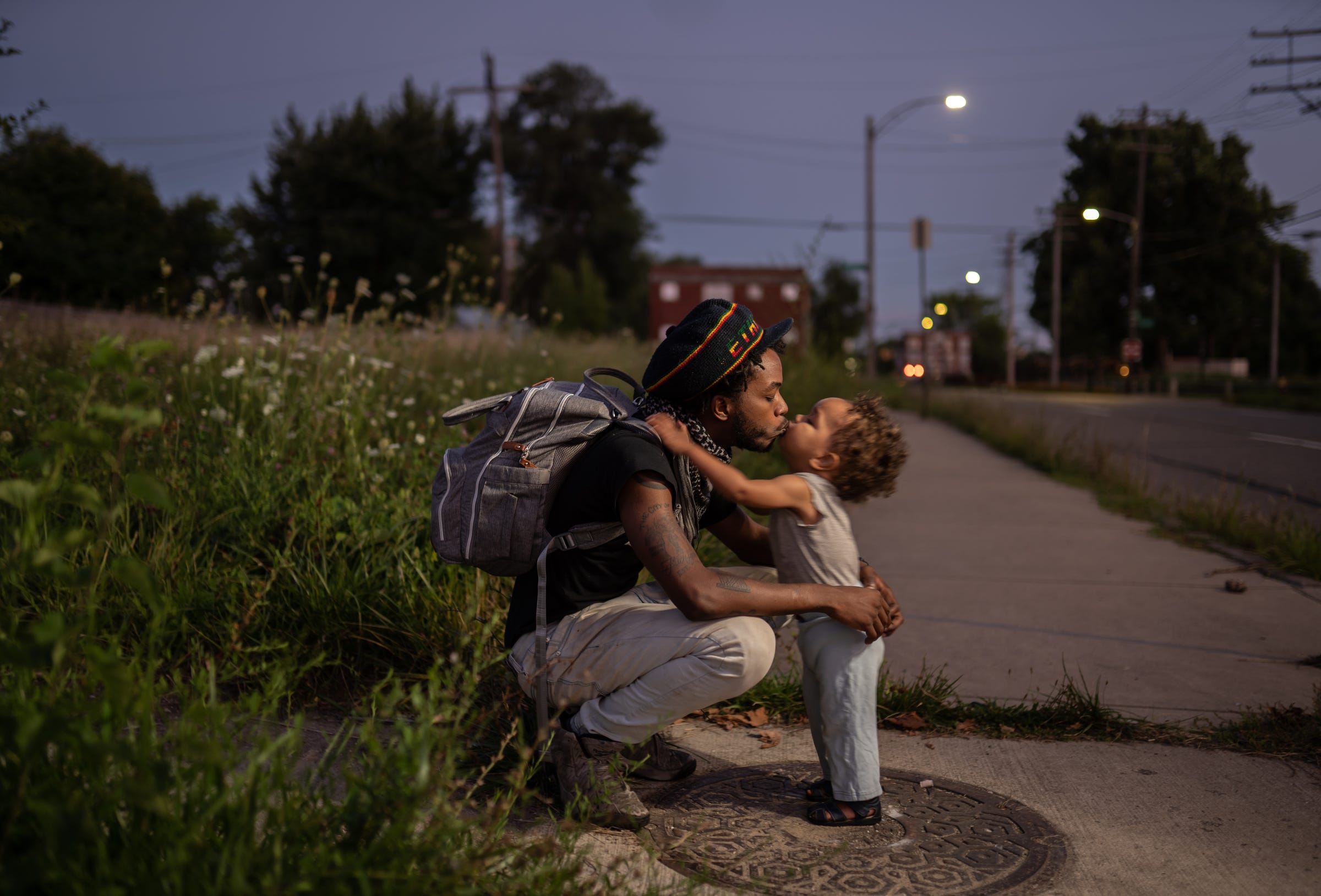 Jah T of Detroit poses for a photo with his son Ziggy in Detroit's north side on Monday, August 17, 2020 at a march against police brutality with Detroit Will Breathe.