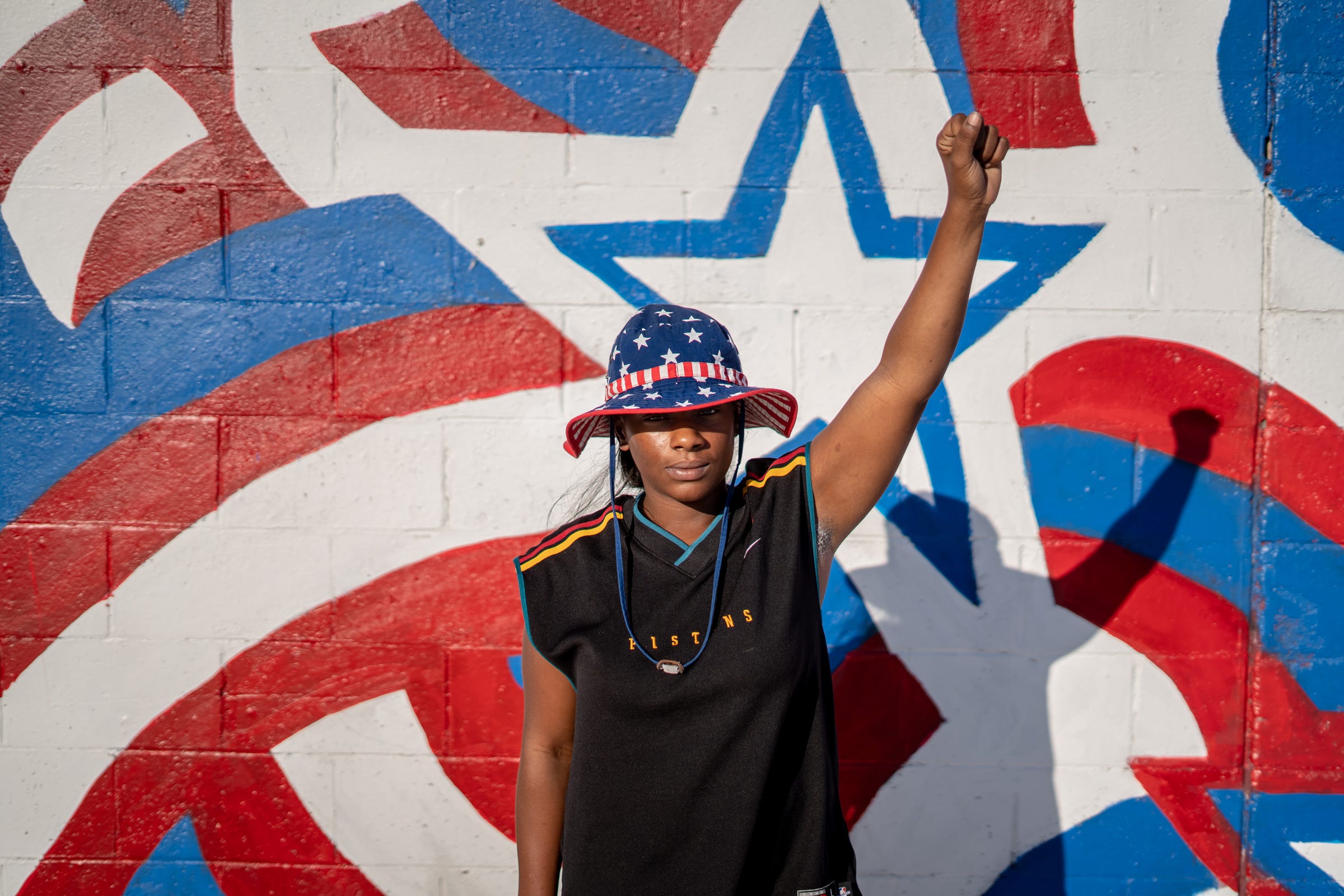 Shaqualla Johnson of Detroit poses for a photo at Veterans Park in Hamtramck on Thursday, August 20, 2020 before the start of a march through the streets for Justice for Yemen march. 