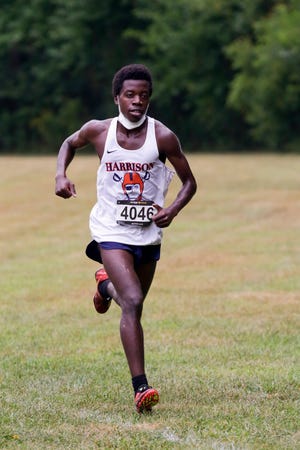 Harrison's Beni Baributsa approaches the finish line during the City/County cross country meet, Tuesday, Sept. 1, 2020 at the Tippecanoe County Amphitheater Park in West Lafayette.