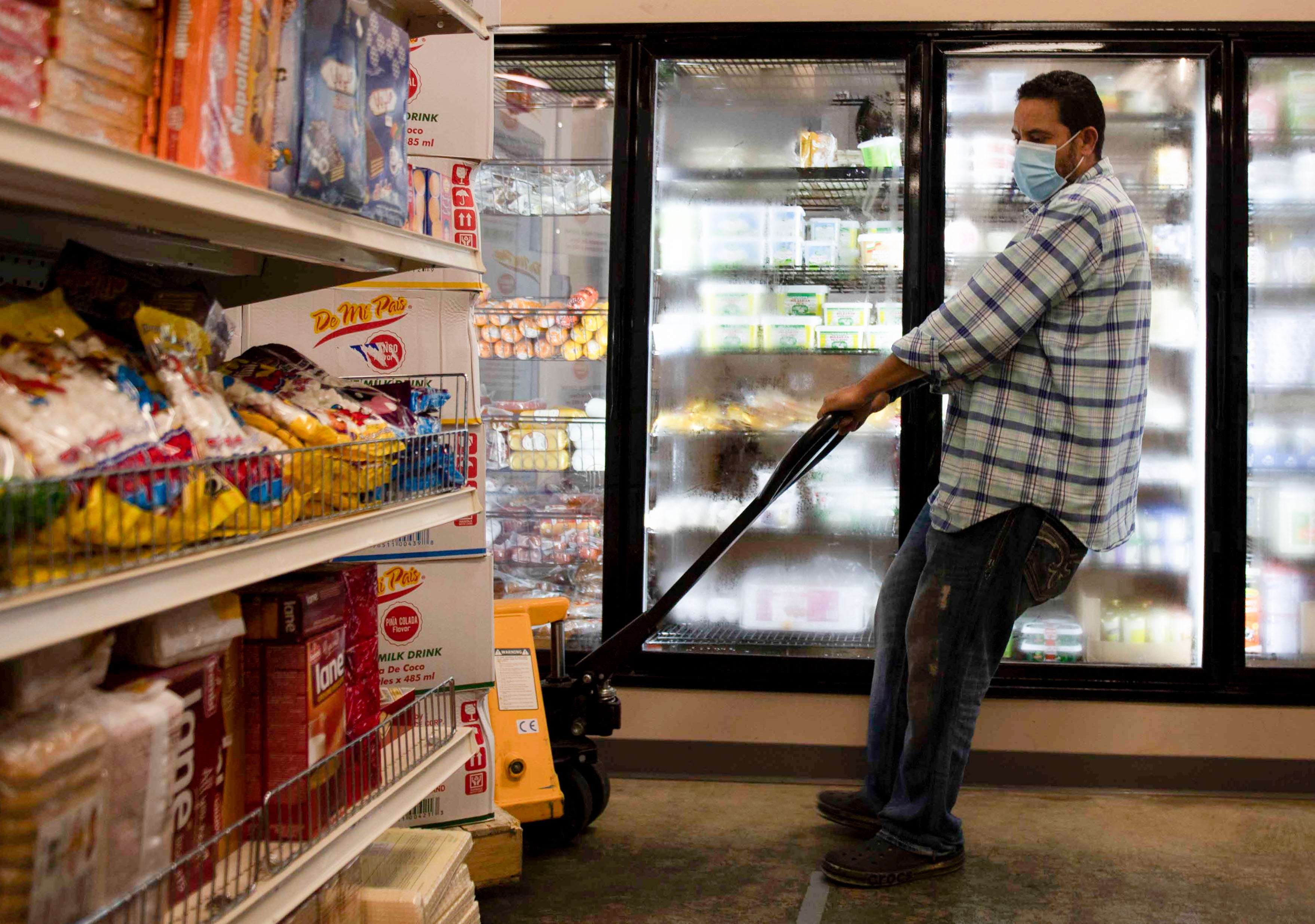 Tamar Eldahan moves the boxes around Alrahmah Mediterranean Grocery in Cordova on Tuesday, Sept. 1, 2020. The Eldahan family has owned the business for 12 years and has served their community in Memphis despite the pandemic and have provided them with essential products.