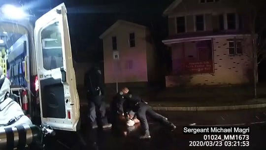 Rochester police body camera footage of police interaction with Daniel Prude on March 23, 2020. Prude became agitated after being hooded eventually a couple of officers held his face sideways against the street.