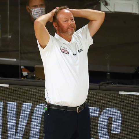 Milwaukee Bucks head coach Mike Budenholzer reacts
