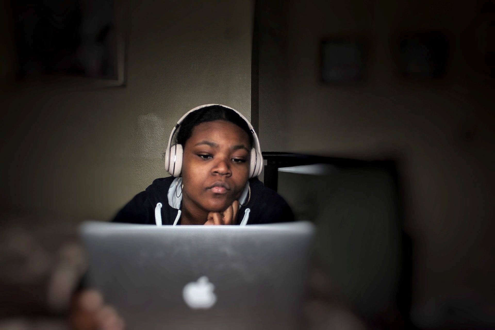 This is a self-portrait of me, Caria Taylor, 17, laying on my bed keeping busy on my laptop at home in Detroit on April 29, 2020. During Covid-19, I've found myself staring at screens more and searching for new things to try and keep busy.