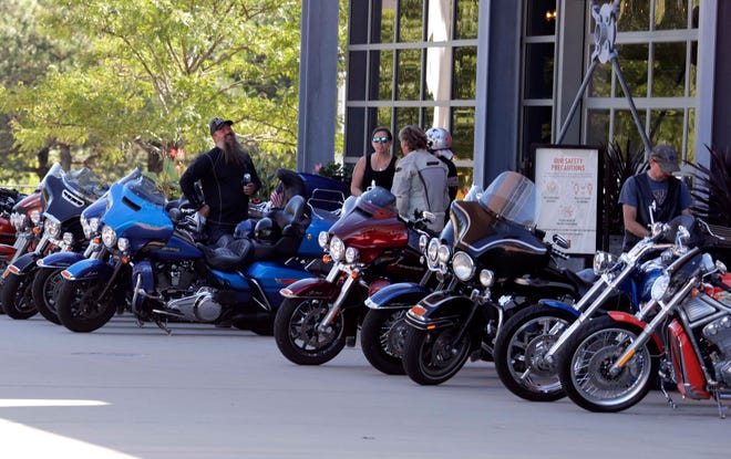 Harley riders arrive at the Harley-Davidson Museum in Milwaukee for the annual Milwaukee Rally Labor Day weekend at dealers throughout the Milwaukee area.