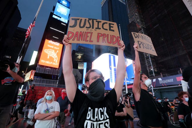 Several hundred people protested in Times Square in Manhattan Sept. 3, 2020 over the death of Daniel Prude at the hands of Rochester police. Prude died of asphyxiation in March after officers placed a hood over his head while he was being detained. 