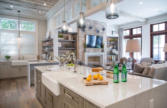 Today's kitchen has a living area outfitted with sofa, stuffed chairs and a big-screen television that is wired for movie marathons, big game day gatherings and Zoom calls. In this space -- which can include a bar area and fireplace -- families can chill out and lounge around in a comfortable atmosphere with easy access to the kitchen and food.