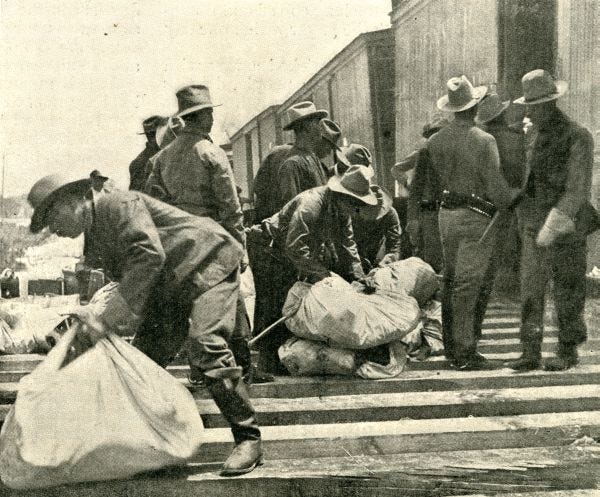 Buffalo soliders detraining at Port Tampa in 1898.