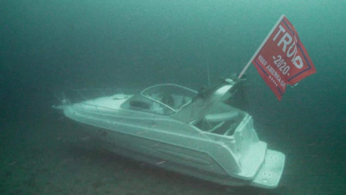 Sunken Boat That Went Viral With Doctored Trump Flag To Be Raised From Michigan Bay