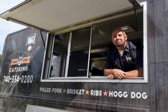Shawn Trout, owner of Hogg Head’s Blue Smoke Barbeque, specializes in sandwiches that put a twist on traditional barbecue. Trout also uses sales from his truck to support the Licking Valley Panther Pantry.