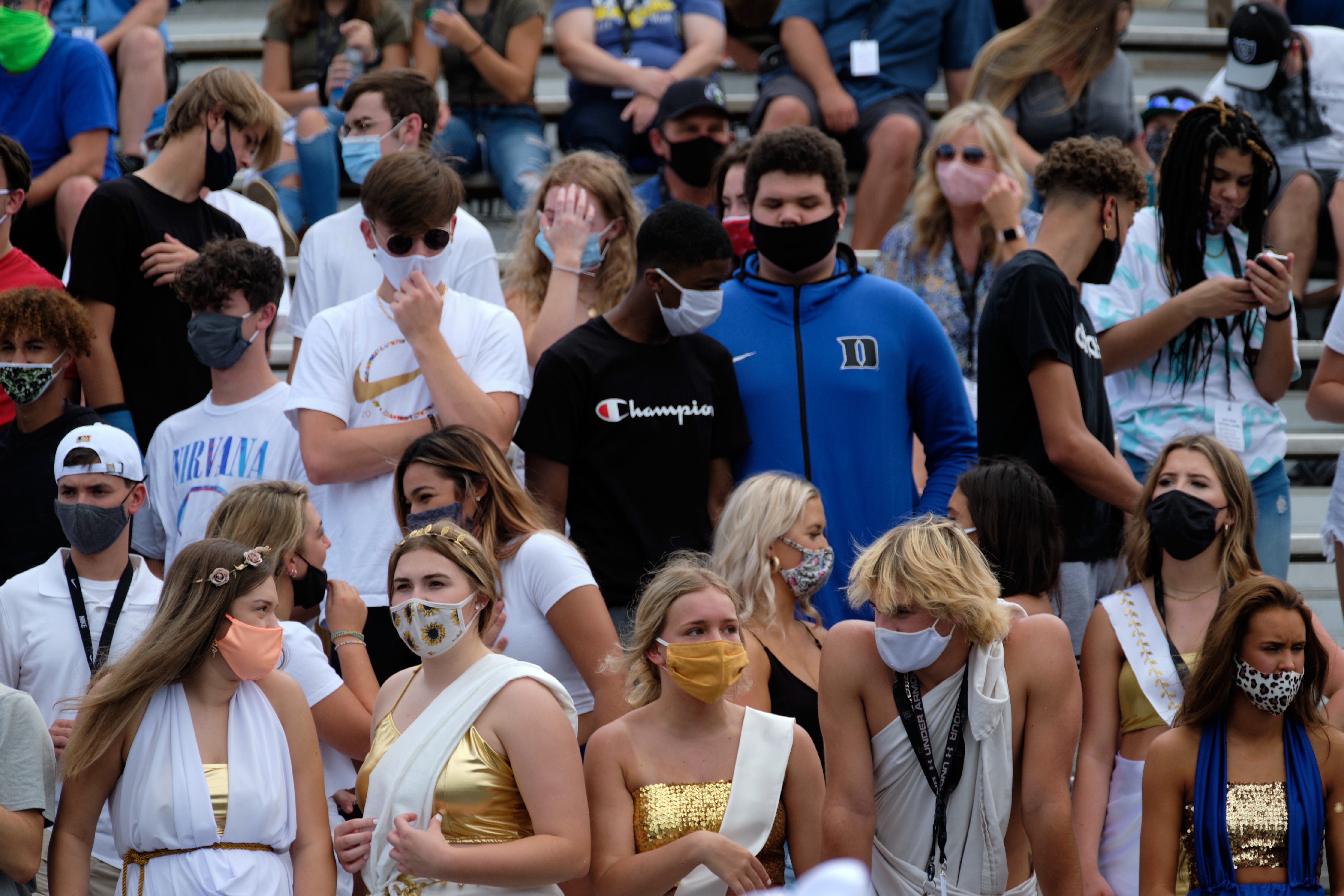 The student section at Karns High School in Knoxville, Tenn., watches their football team take the field Aug. 29.