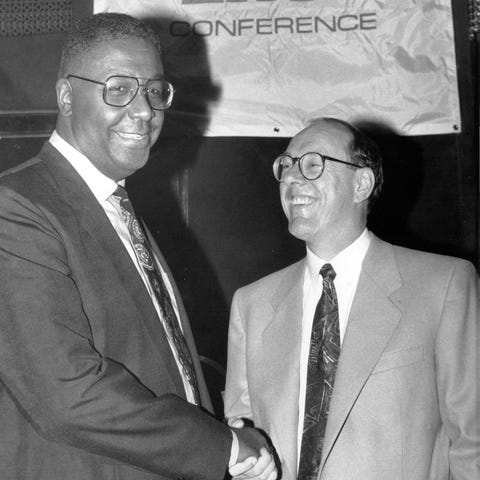 Georgetown's John Thompson, left, and Syracuse's J