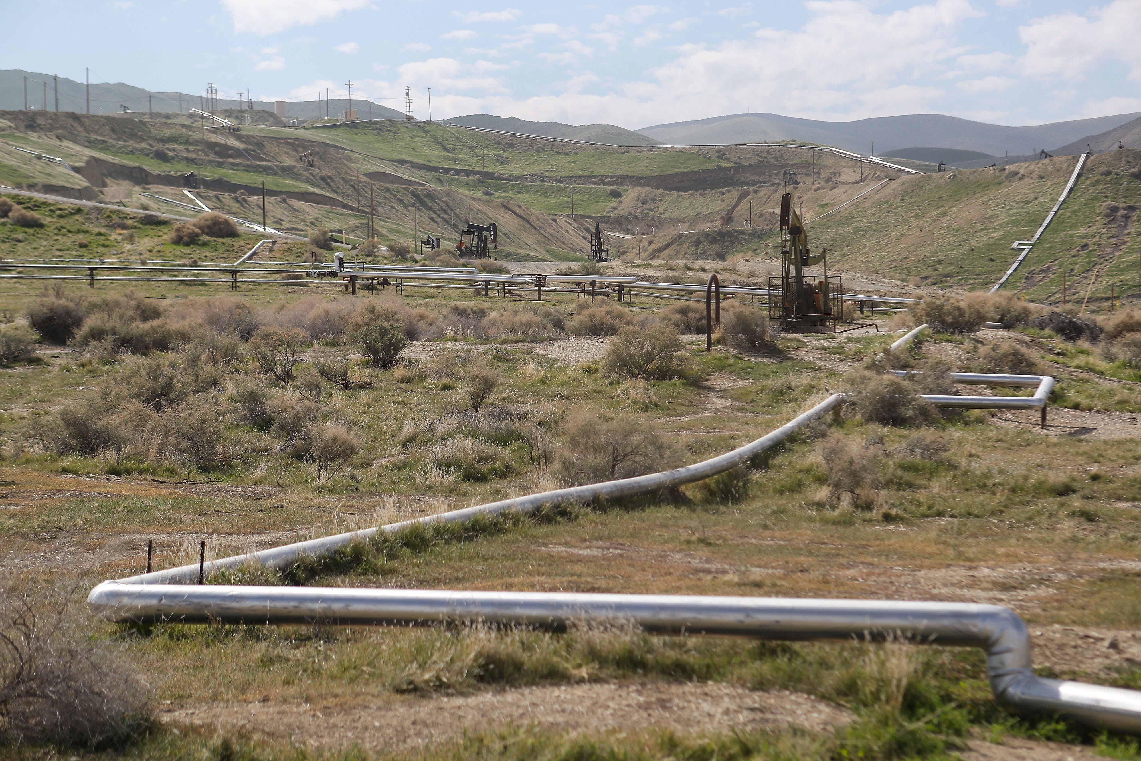 Oil and steam pipelines crisscross the oil fields in Kern County, California.
