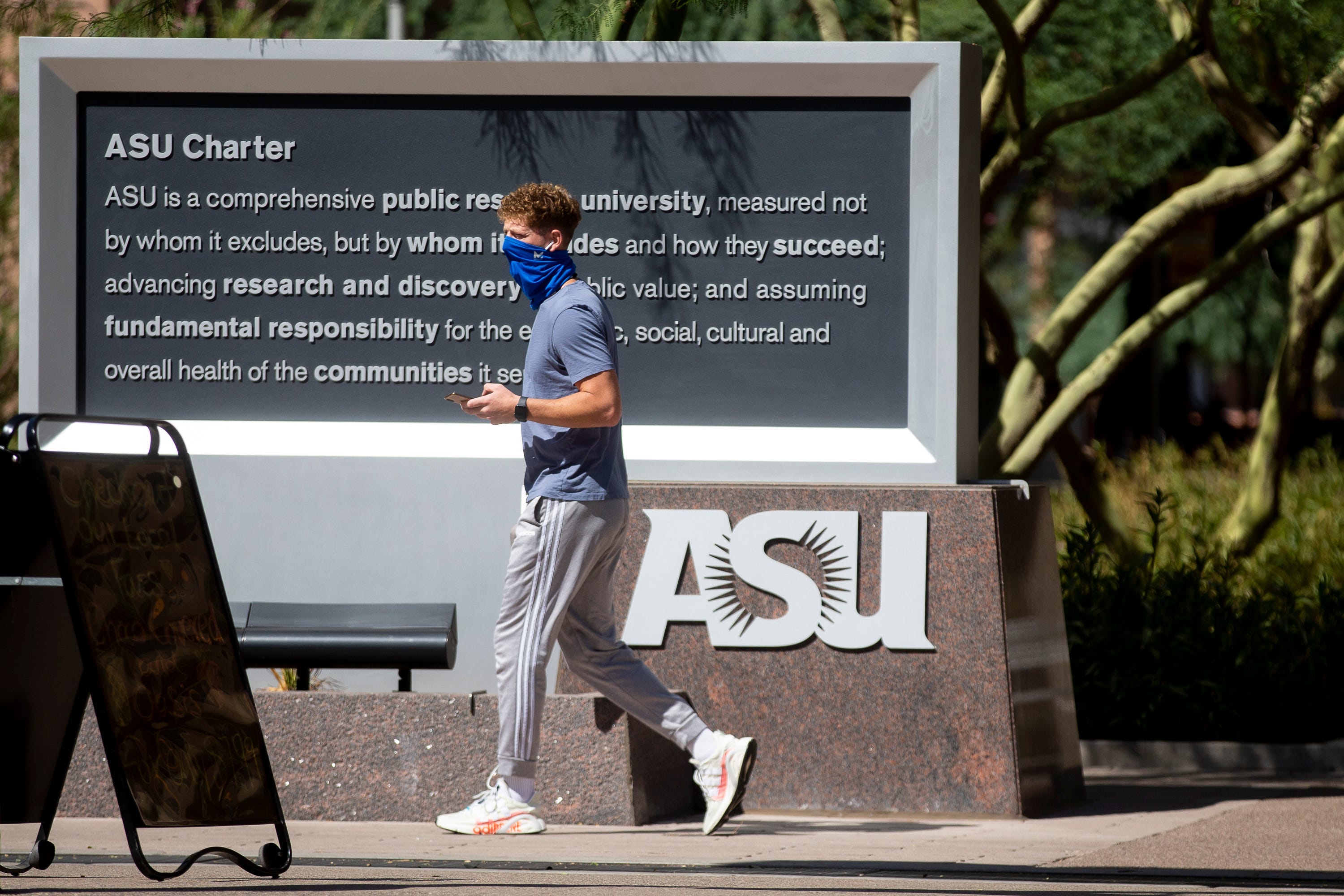 Arizona State University students walk through Taylor mall at the school's downtown Phoenix campus.