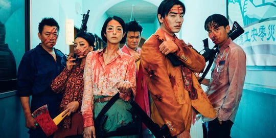 A scrappy group has to fight their way out of a zombie-infested government building in the Taiwanese horror comedy "Get the Hell Out."