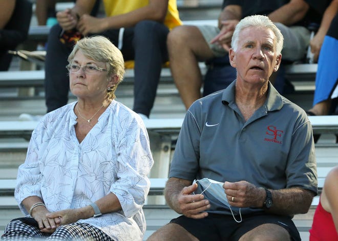 Former South Fork head coach Dennis Lavelle (right) watches the Bulldogs play Sebastian River in a high school football game at South Fork High School on Friday Sept. 11, 2020 in Stuart.