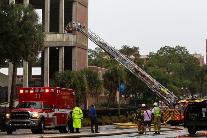 Firefighters respond to a fire in Ben Hill Griffin Stadium on Saturday. Photos of smoke coming from the stadium were widely circulated on social media, with some people claiming the stadium was on fire.
