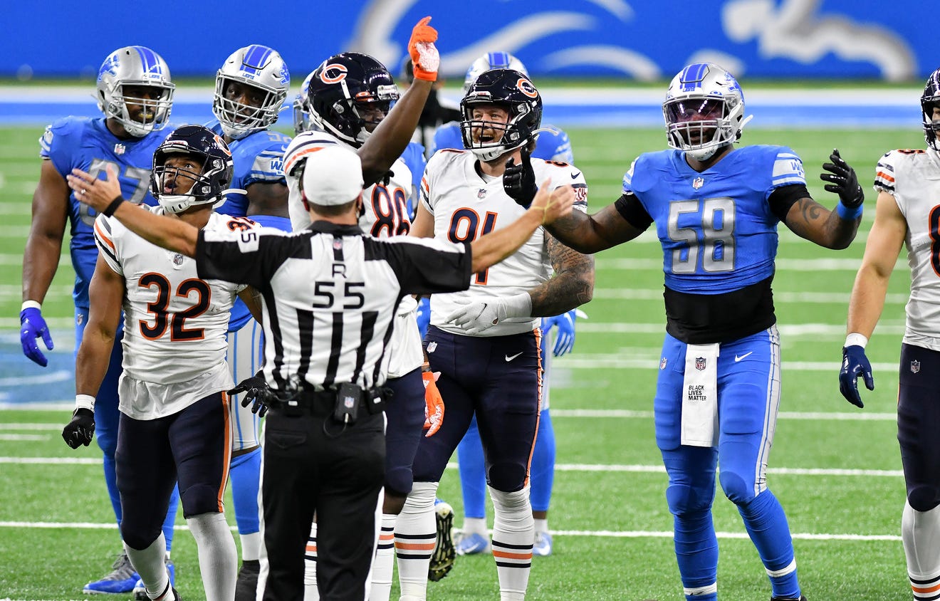 Lions linebacker Jamie Collins Sr. (58) reacts after a flag is thrown on him for unsportsmanlike conduct in the first half.  After the initial penalty the officials conferred and he was disqualified from the game.
