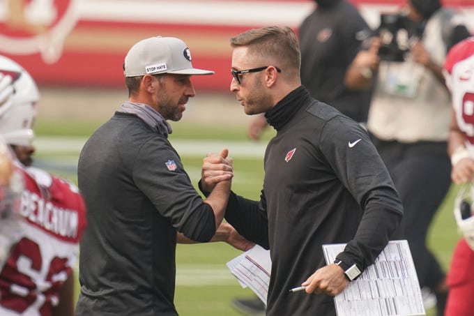September 13, 2020; Santa Clara, California, USA; San Francisco 49ers head coach Kyle Shanahan (left) shakes hands with Arizona Cardinals head coach Kliff Kingsbury (right) after the game at Levi's Stadium. Mandatory Credit: Kyle Terada-USA TODAY Sports