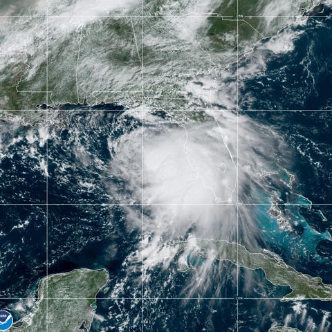 Tropical Storm Sally moves west-northwestward thro