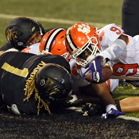 Clemson running back Travis Etienne reaches out to