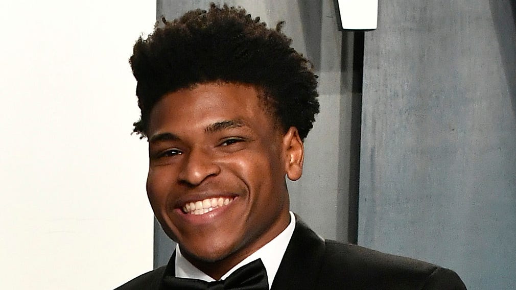 "Cheer" star Jerry Harris' popularity with viewers following the debut of the Netflix series scored the cheerleader an invite to Vanity Fair's Oscar Party on Feb. 9, 2020 in Beverly Hills.