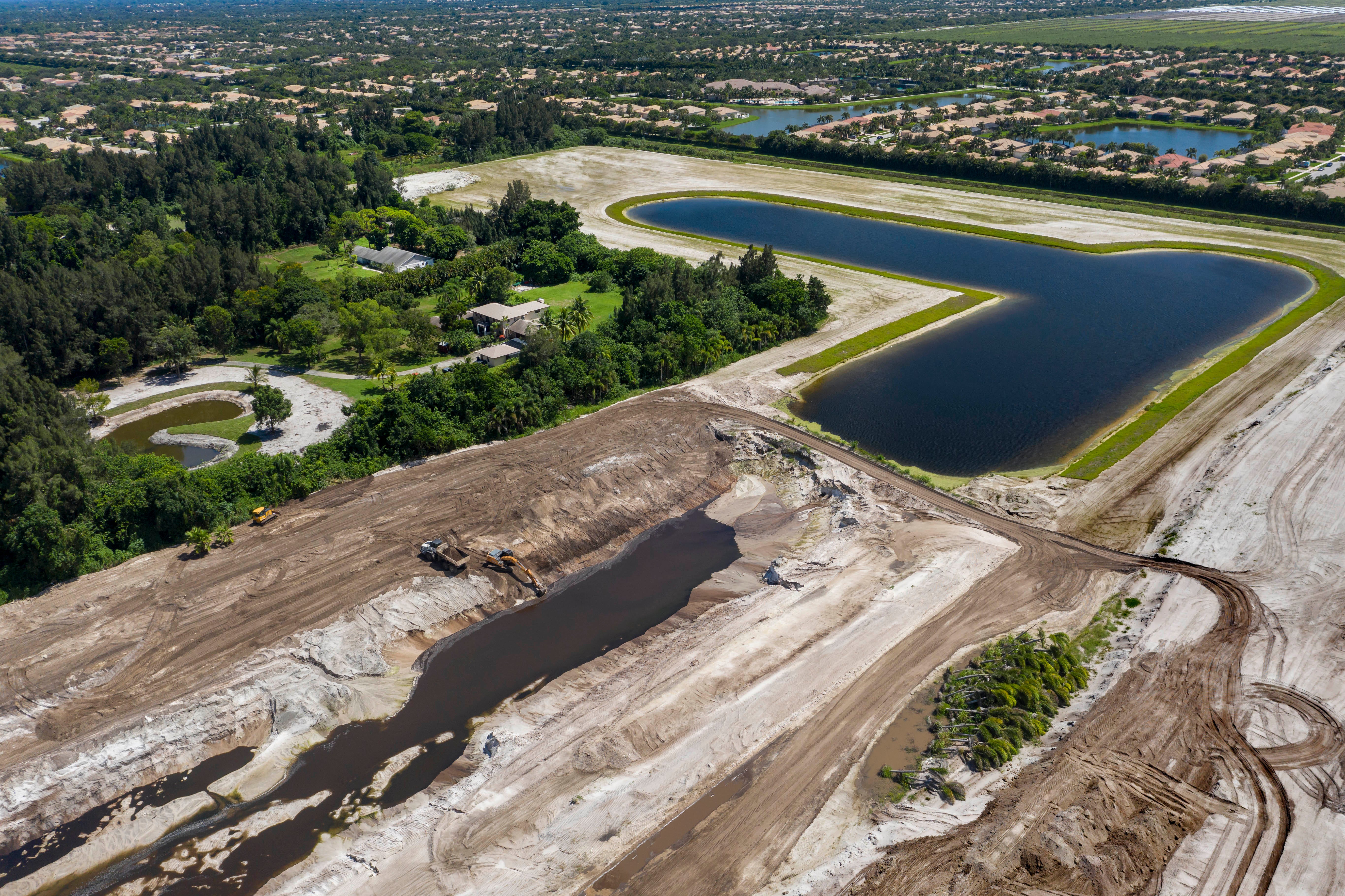 Man ignoring county's orders to stop building lake west of Boynton