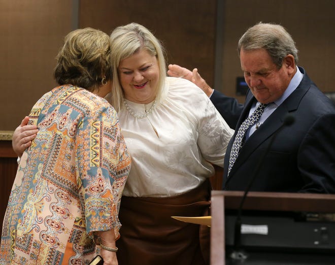 Christy Bobo took the oath of office administered by Hardy McCollum with help from his wife Juanita who held the Bible at Northport City Hall Tuesday Sept. 14, 2020. Bobo was sworn in to fill the vacated District One city council seat. [Staff Photo/Gary Cosby Jr.]