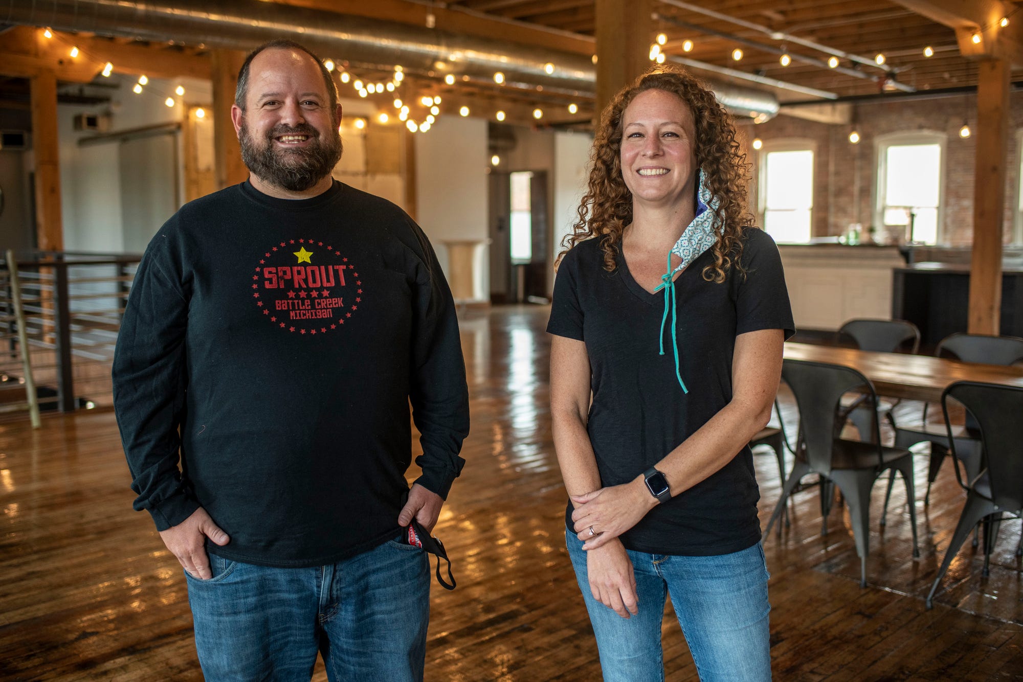 Sprout CEO Jeremy Andrews and operations manager Lydia Marucco stand for a portrait on Tuesday, Sept. 15, 2020 at Record Box Loft in Battle Creek, Mich. Sprout is partnering with Restore 269 to open a downtown market and deli in Battle Creek.