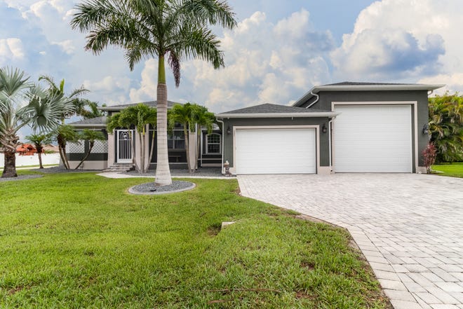 Andrew and Mary Courtade's home in Cape Coral has a 17,000 square foot lot as well as a huge RV garage.
