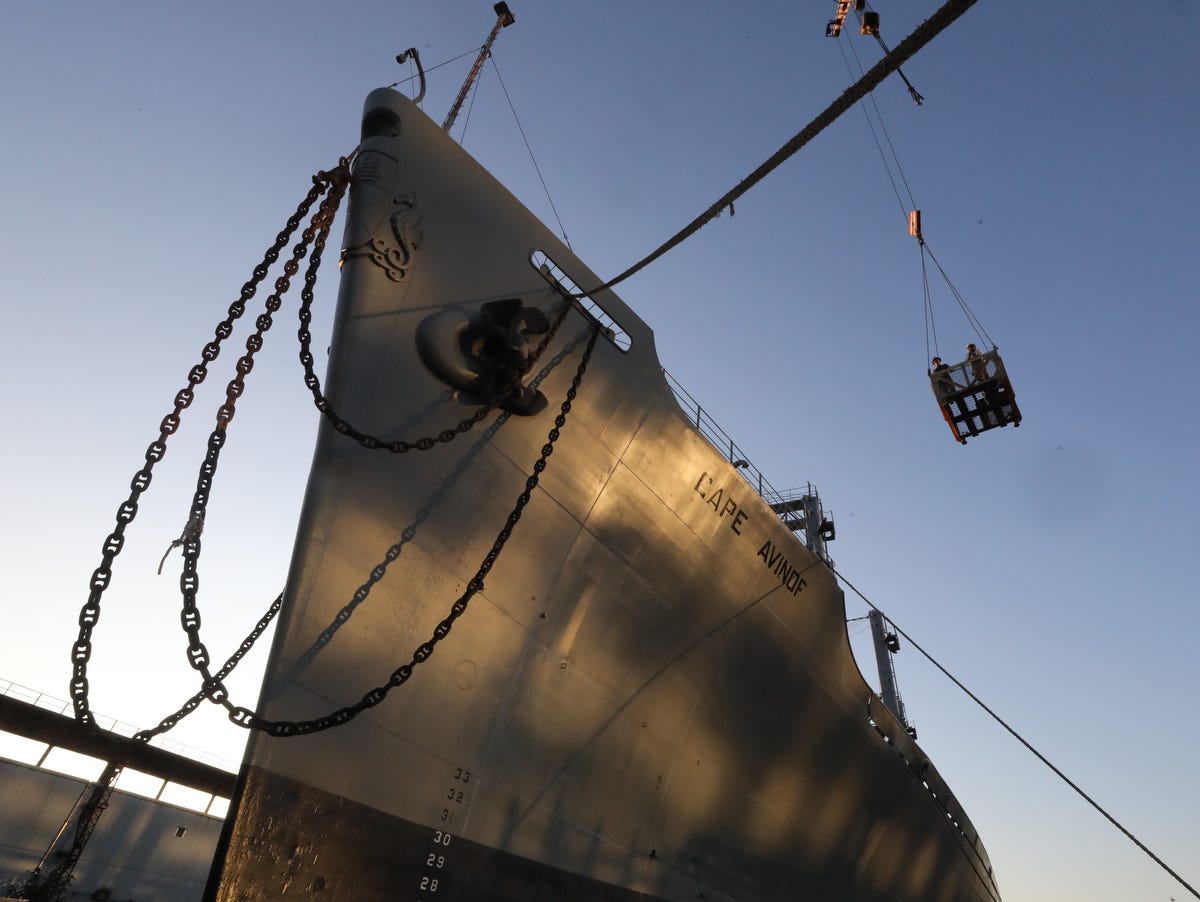 The Cape Avinof, a cargo ship, was moored at the Brooklyn Navy Yard before it was transported to Norfolk, Virginia by Vinik Marine tugboats.