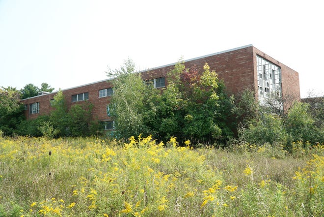 One of the 11 remaining out-buildings at the former Northville Psychiatric Hospital grounds lies on its northwestern perimeter.