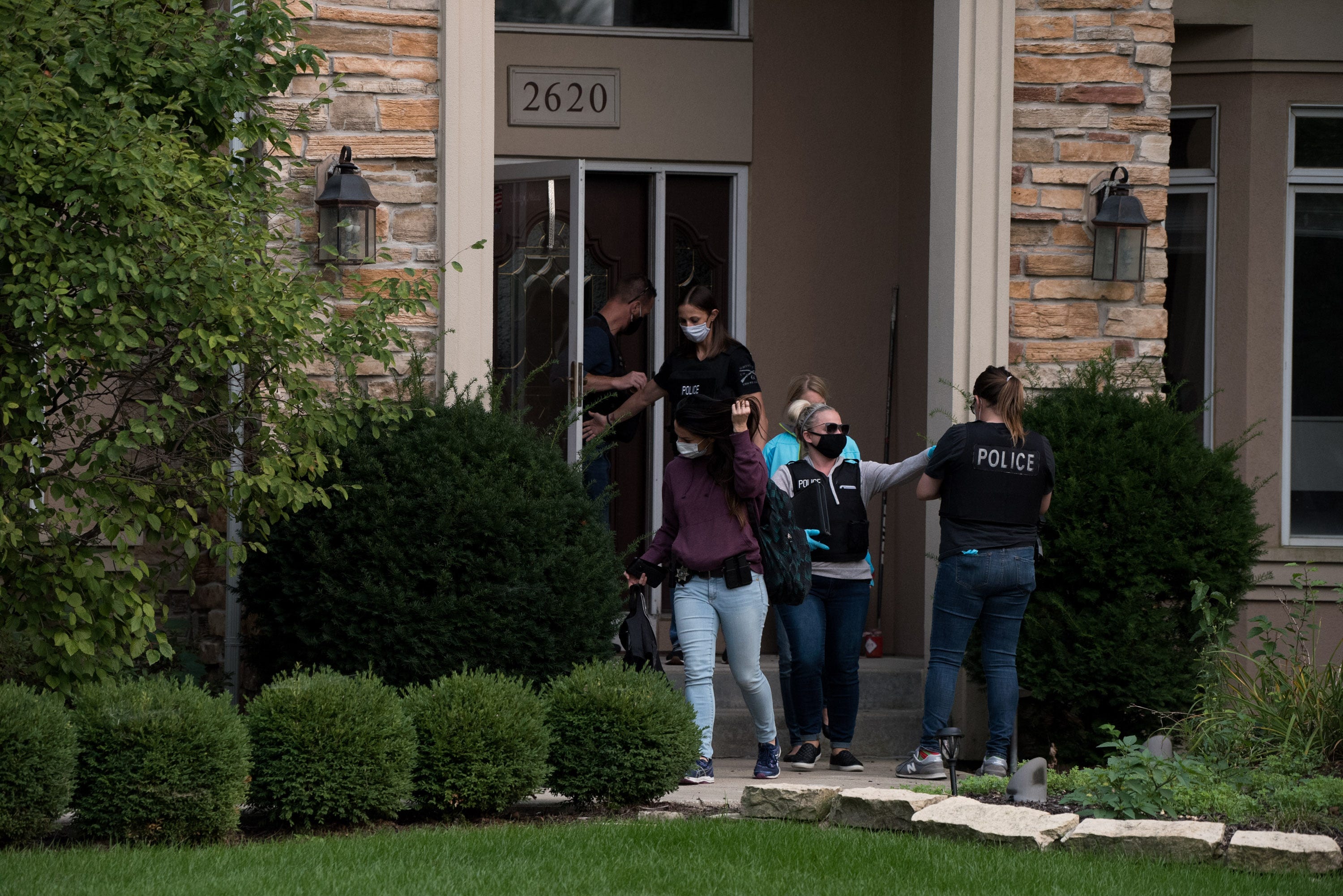 FBI executes a search warrant at a home in Naperville, Illinois. on Sept. 14, 2020. The search was part of an investigation into allegations that Netflix "Cheer" star Jerry Harris solicited nude photos and sex from minors.