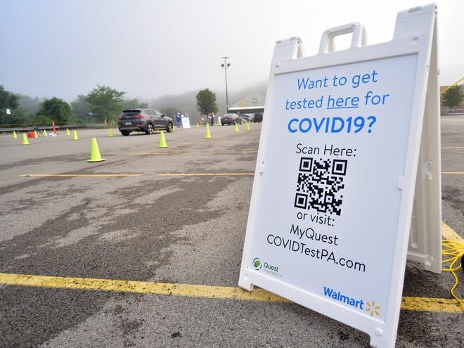 COVID-19 testing in the parking lot of the Walmart on Constitution Boulevard in Chippewa Township.