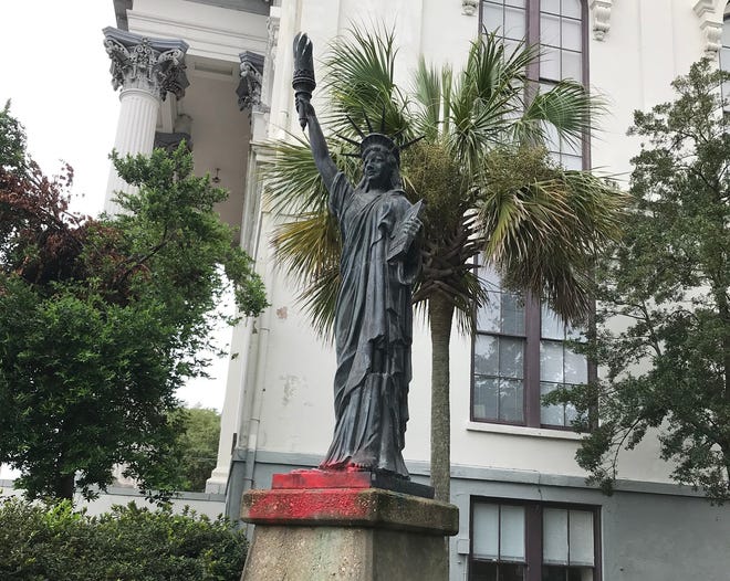 A miniature version of New York City's Statue of Liberty, located next to Thalian/City Hall in downtown Wilmington, has stood since 1950.