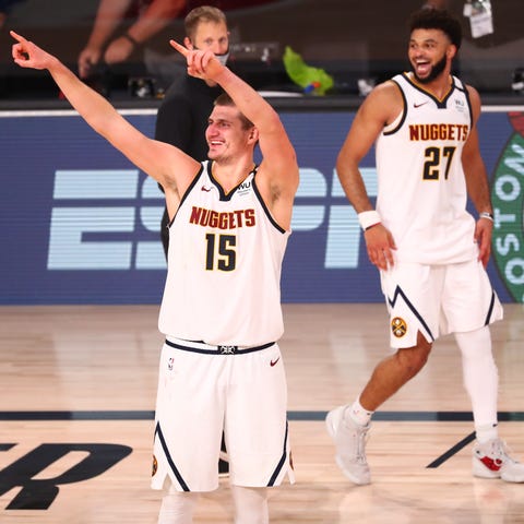 Denver Nuggets center Nikola Jokic and guard Jamal