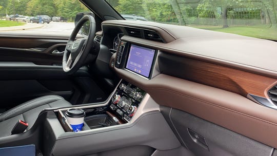 The 2021 GMC Yukon Denali's dashboard, including its' flush-set touch screen, are unique from lower trim levels.