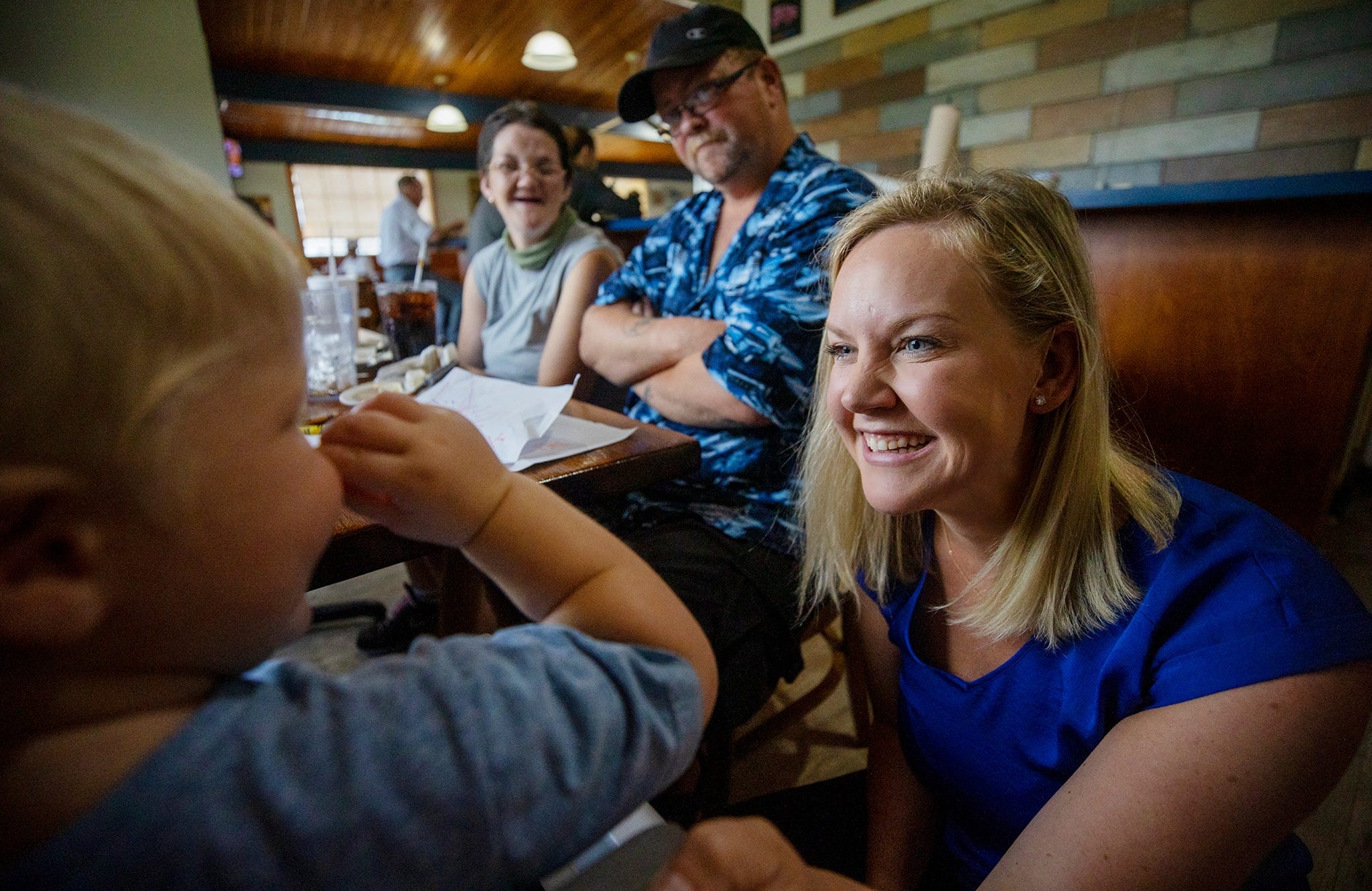 Better Together’s Megan Rose, right, joined Jack and his parents Kyrstal Hartman and Jason Davis for lunch at the Farmers Market Restaurant in June.