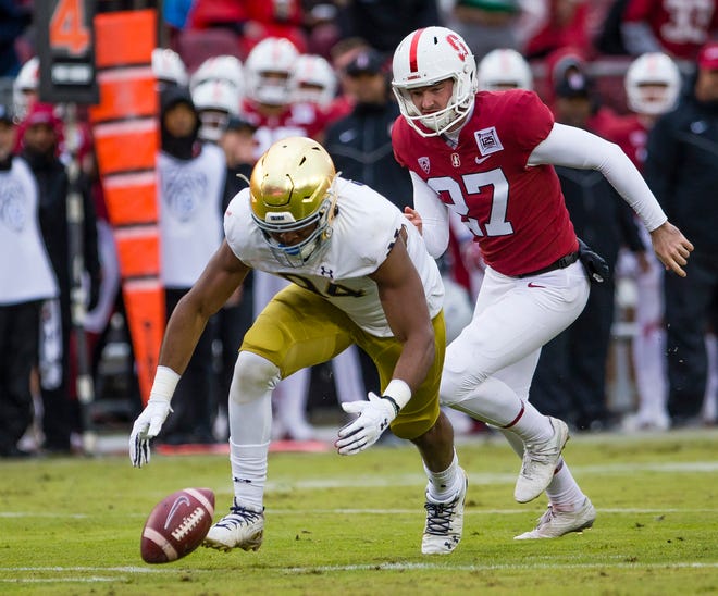 Notre Dame’s Isaiah Foskey (94) chases down a loose ball during the Notre Dame vs. Stanford NCAA football game Saturday, Nov. 30 at Stanford Stadium in Palo Alto, California.