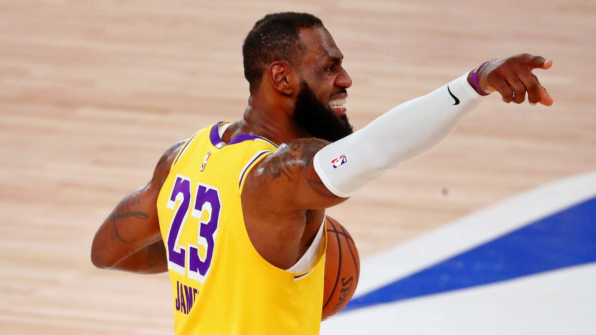 LeBron James gestures to his team during the third quarter of the Lakers' Game 1 win over the Nuggets.